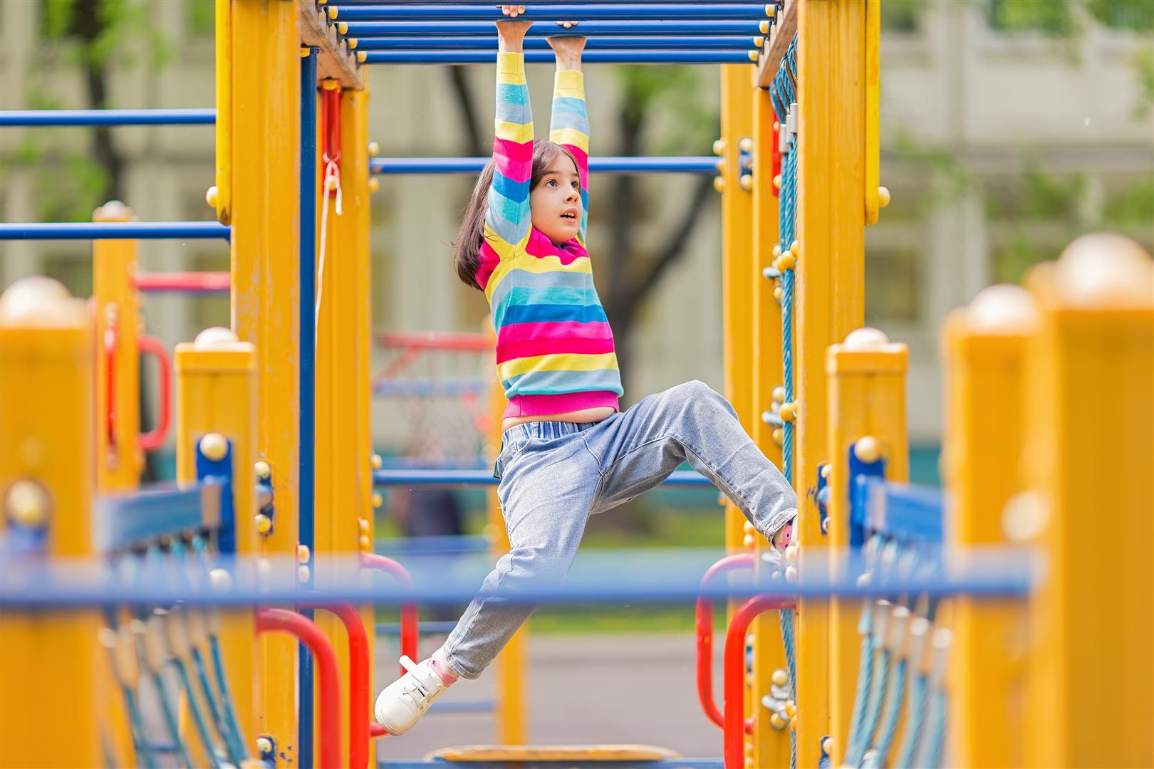 a-little-girl-hangs-on-a-childrens-ladder-on-a-bri-2026-01-06-08-56-30-utc