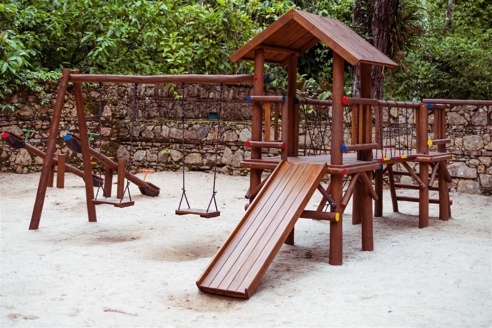 wooden-playground-in-lush-park-2026-03-10-02-10-21-utc